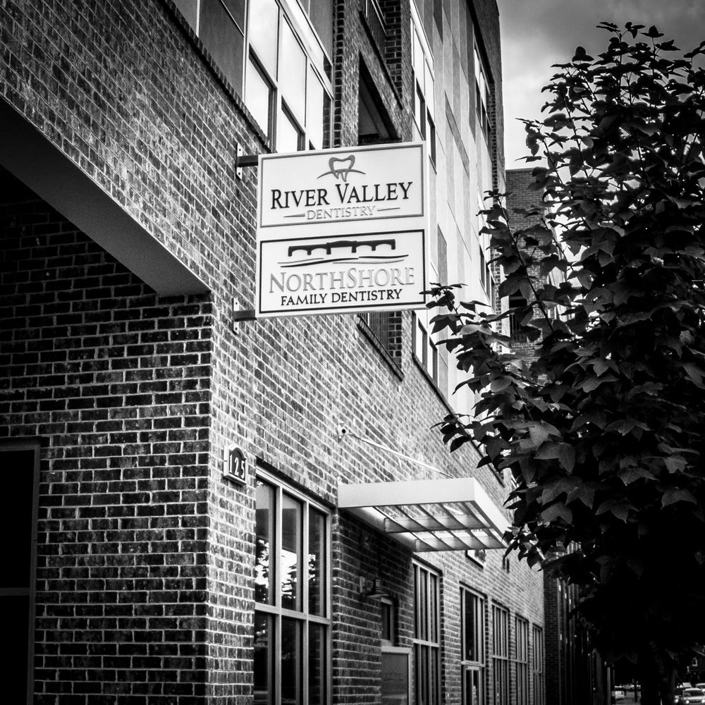 Black and white photo of the River Valley Dentistry building sign